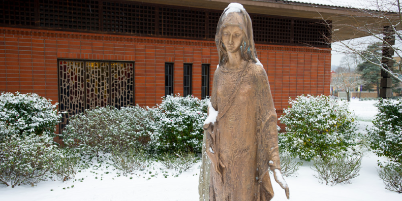 Statue of Mary in snow