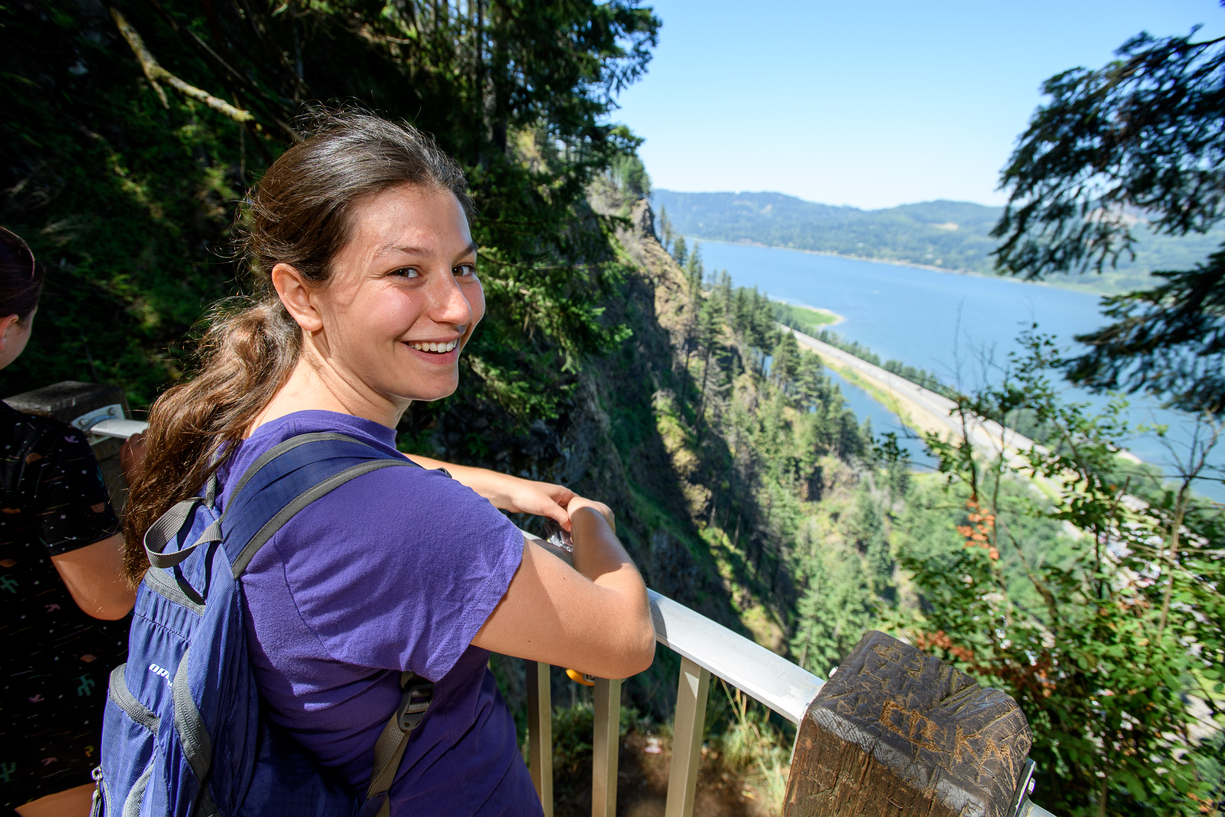 student hiking outside