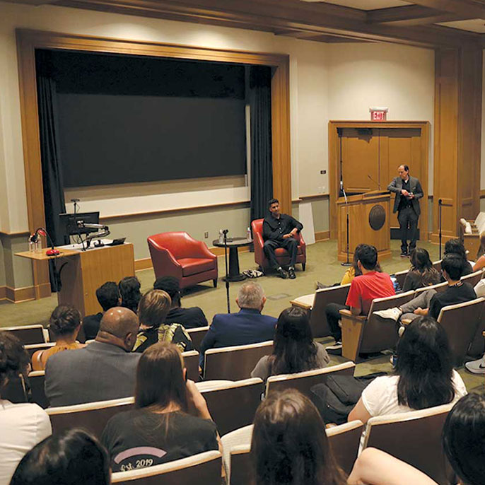 Students listen to Walter Thompson-Hernández during an on-campus event.