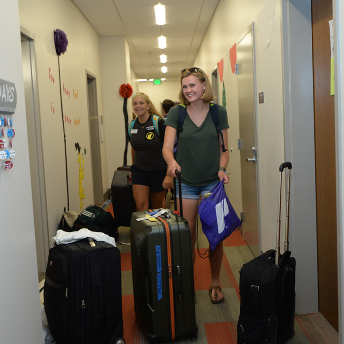 Students arrive in Lund Family Hall on Move-In Day