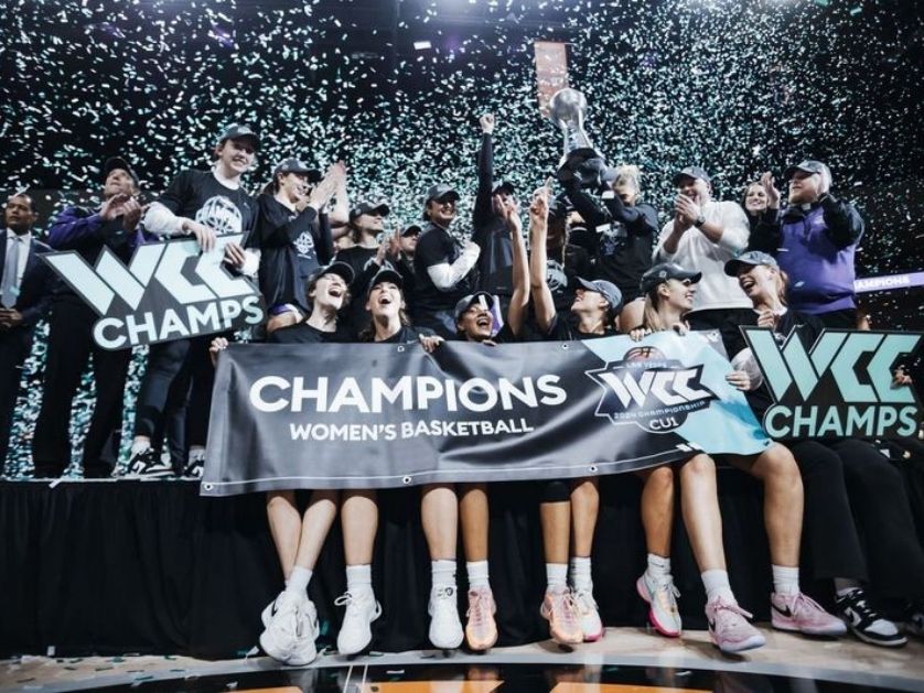 The women's basketball team celebrates at the WCC championships