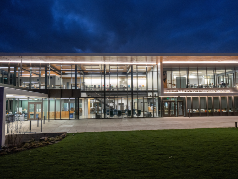 The exterior of the Shiley Marcos Center for Design at twilight