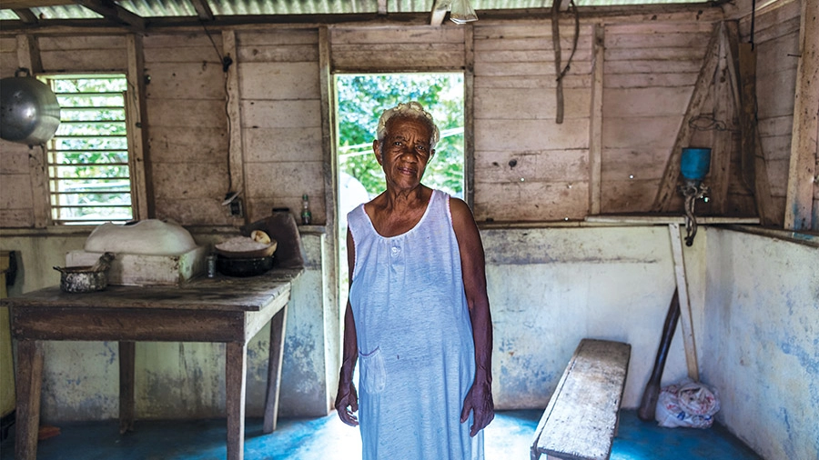 Victoria Copeland Sheppard stands in a barn