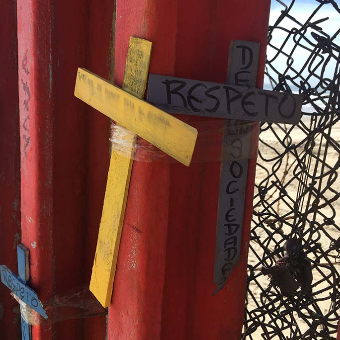 Border wall with crosses on it.