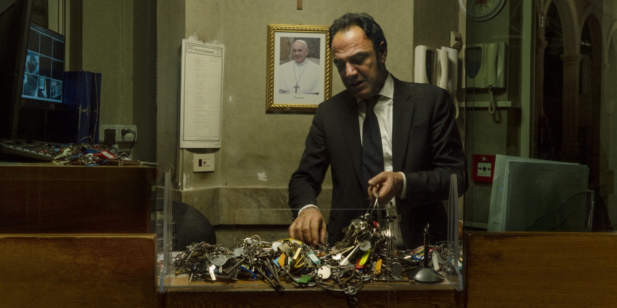 The nightly lockdown begins: Gianni Crea stands at the central security station, Atrium of the Four Gates with dozens of keys to various chapels and rooms.