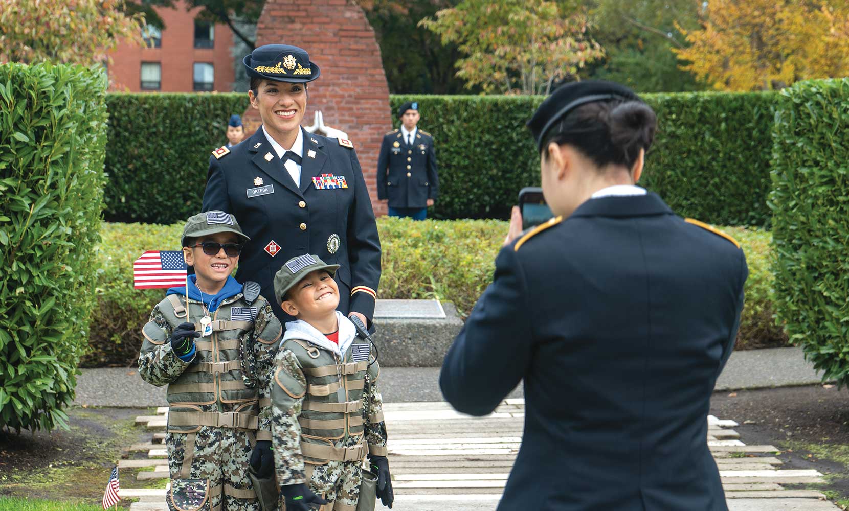 Major Maribel Ortega de Pacheco and her children