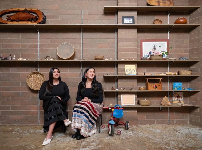 The Watson sisters seated in the library at UP