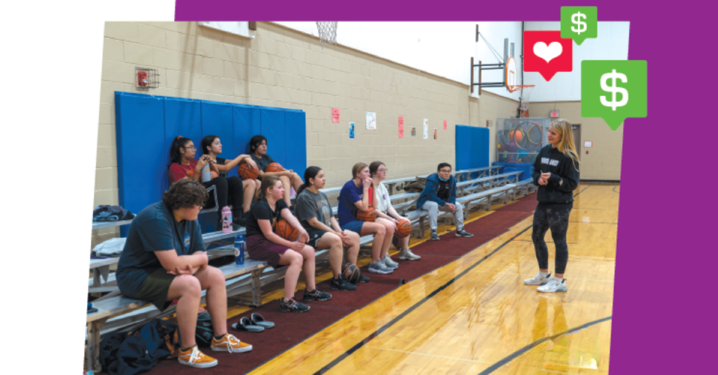 McKelle Meek '24 (far right, standing) talks with students at a North Portland basketball clinic.