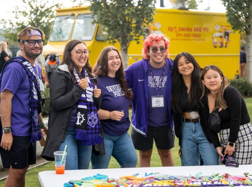 Students gathered at a campus event outside